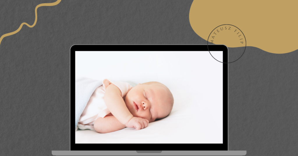 laptop with an image of baby sleeping