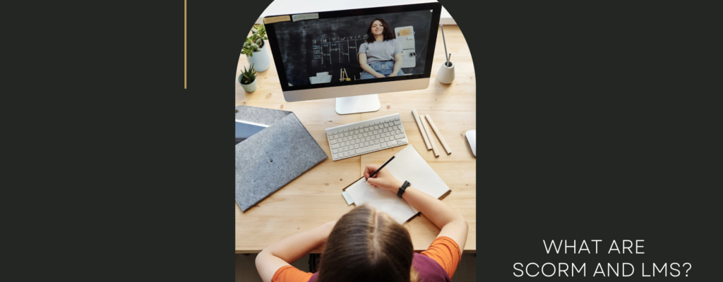 An image of a lady writing a notes and watching a training on a computer.